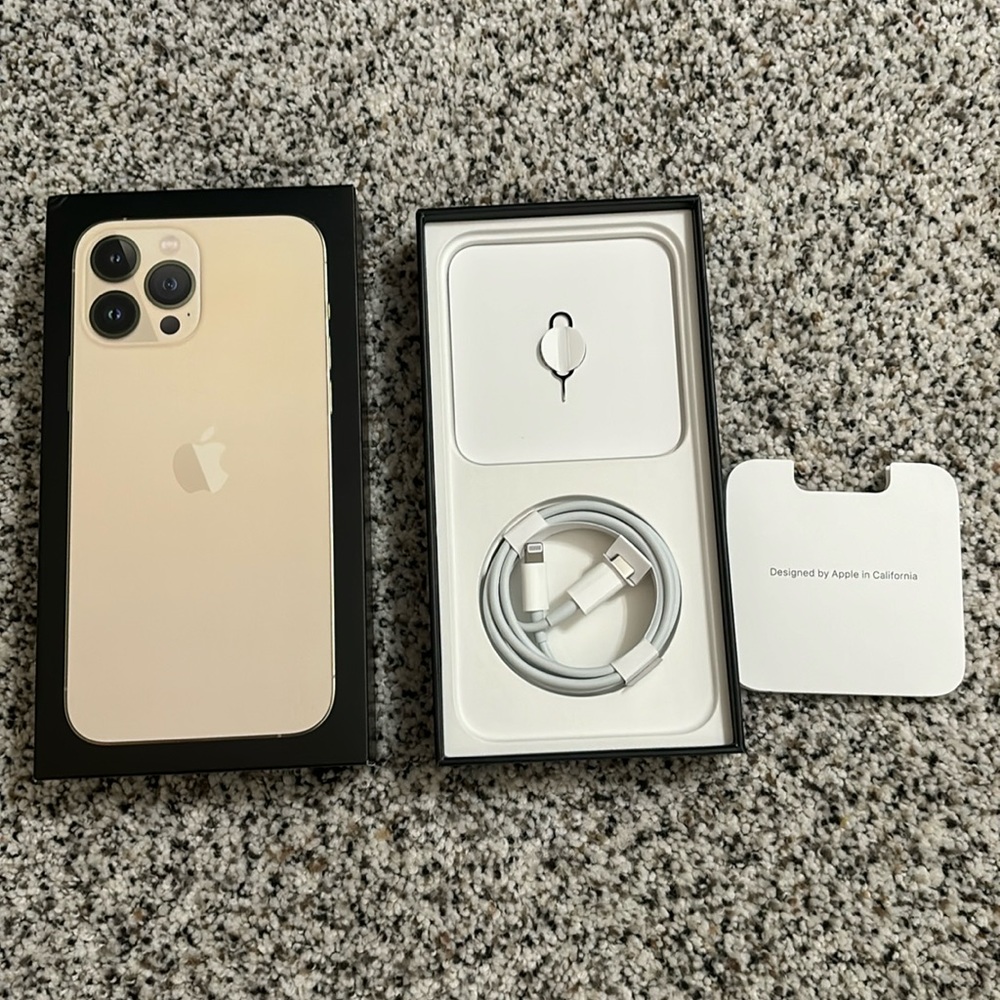 iPhone 13 Pro Max gold box with cord and reset tool small corner wrinkle